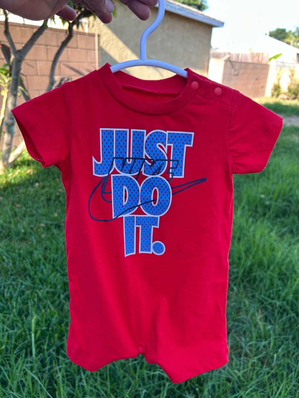 Nike Red Short-Sleeve Baby Romper with Blue 'Just Do It.' Graphic